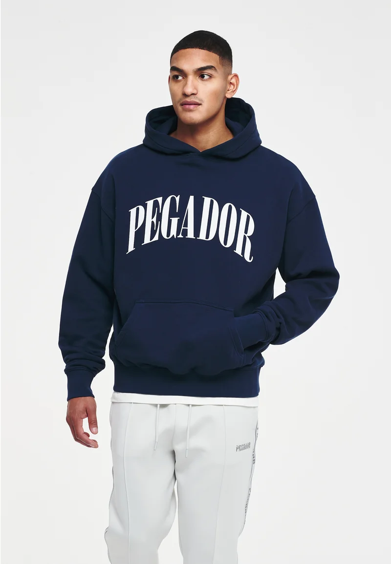 Elevating Your Look – The Versatile Appeal of the Pegador Hoodie